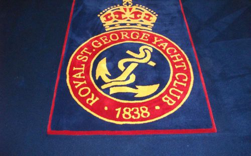 Hand tufted club crest inset into carpet
