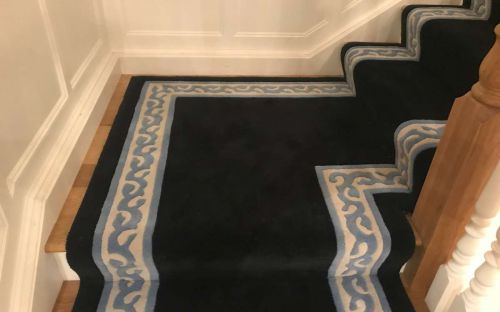 Blue carpet with light blue Ennell border in a residential house