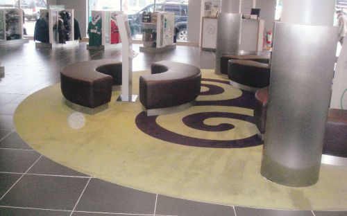 Hand tufted inset carpet in lobby