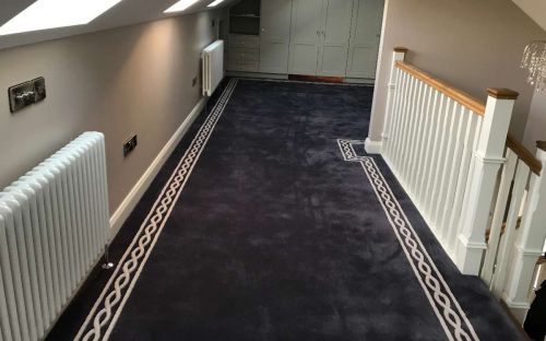 Hand Tufted loft carpet with corrib border