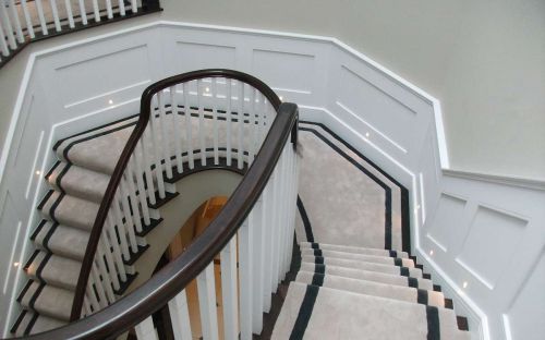 Hand tufted off-white stairs with dark grey border