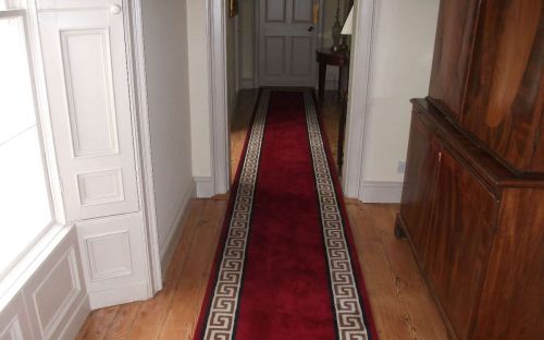 Hand tufted Red hall runner with greek key border
