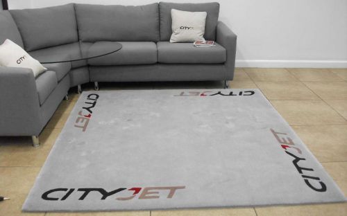 Hand tufted rug in city jet lounge area