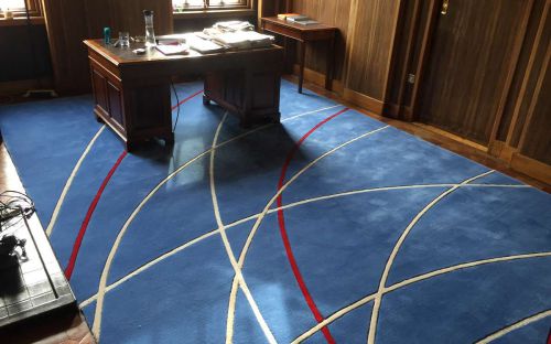 Hand tufted rug in office