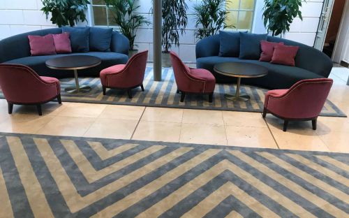 Hand tufted rugs in lobby